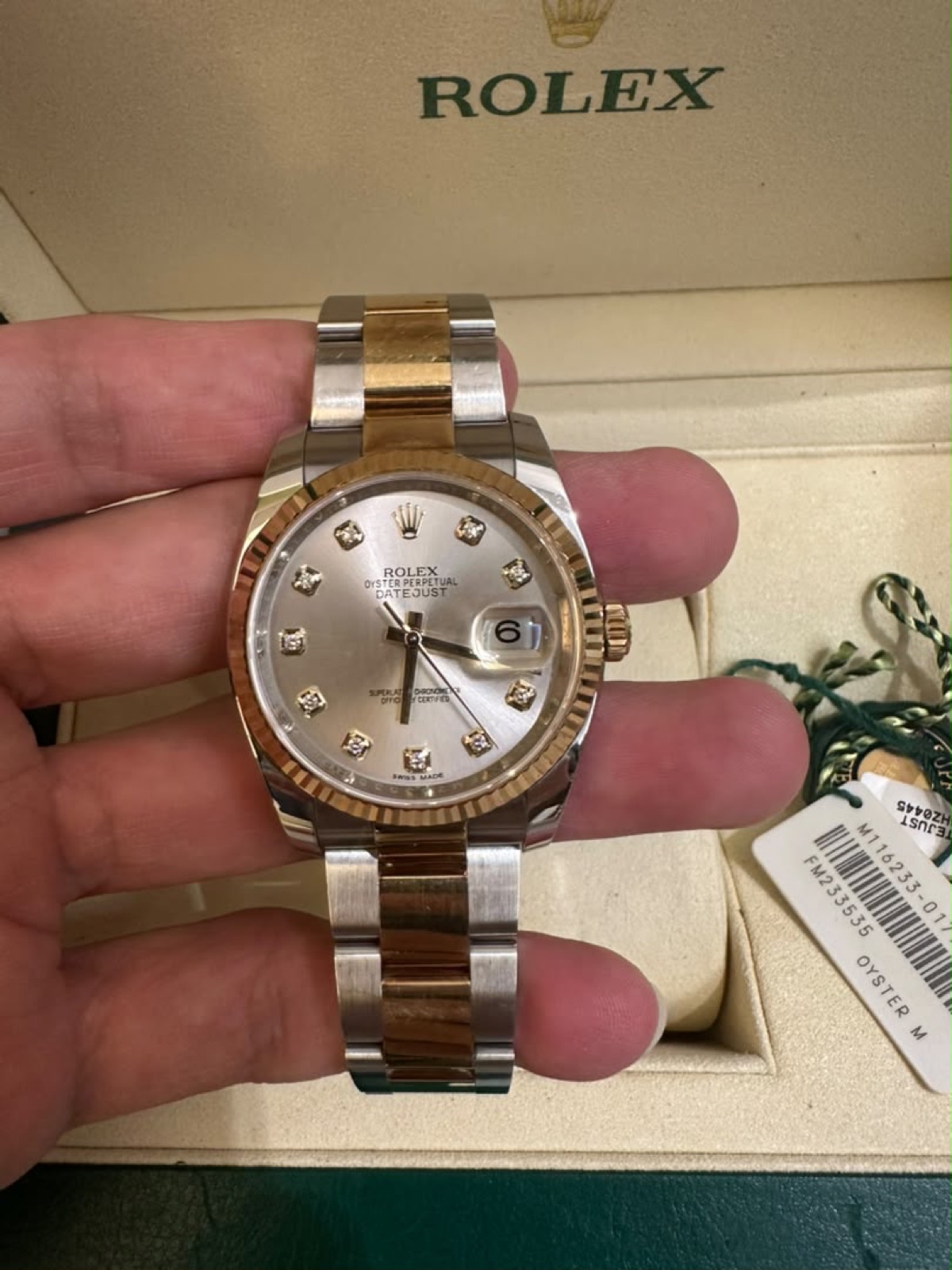Rolex Datejust, fluted bezel, held in hand