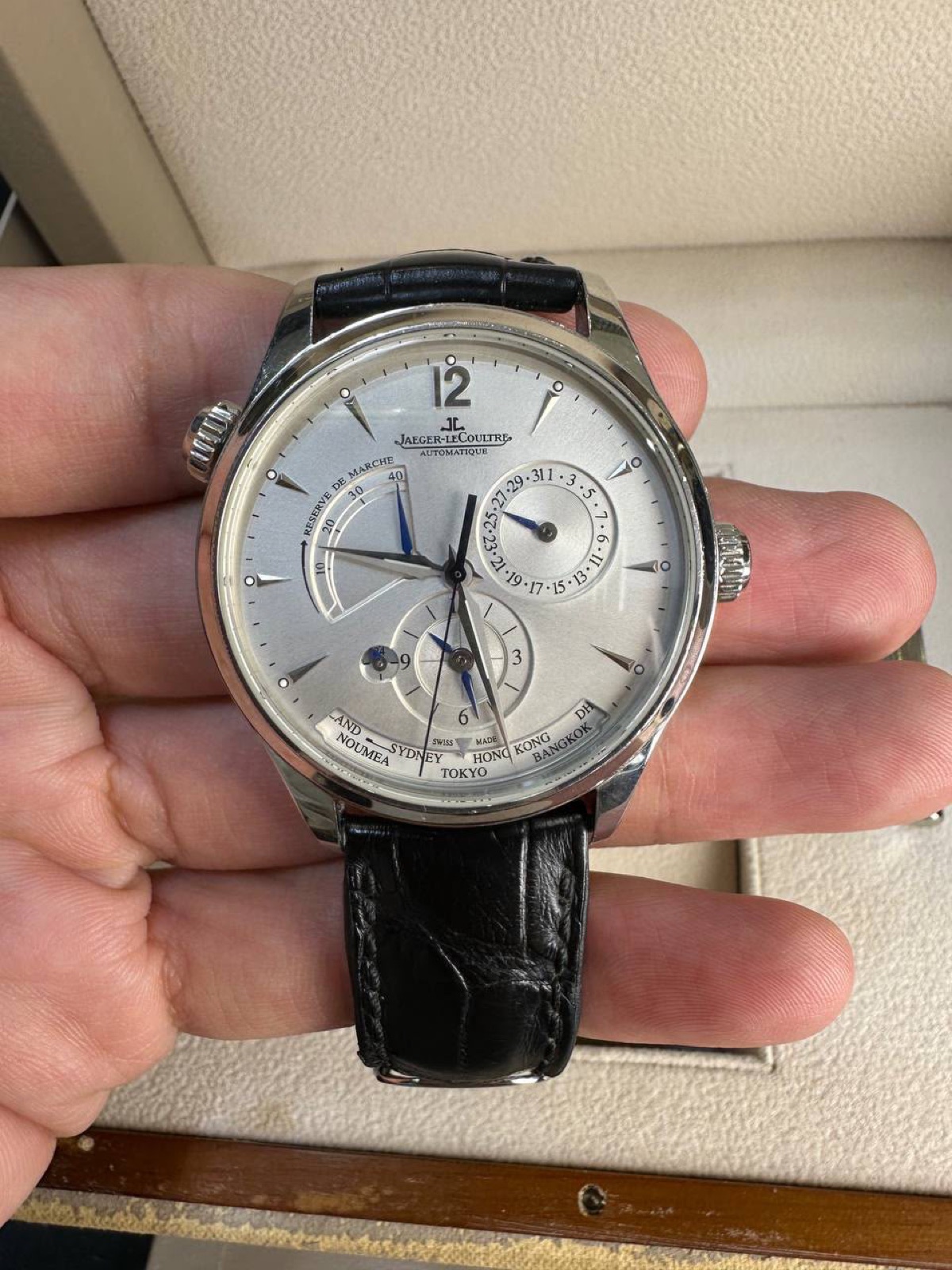 Jaeger-LeCoultre Master Control, silver dial, held in hand